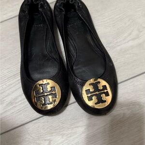 Tory Burch Black and Gold Flats